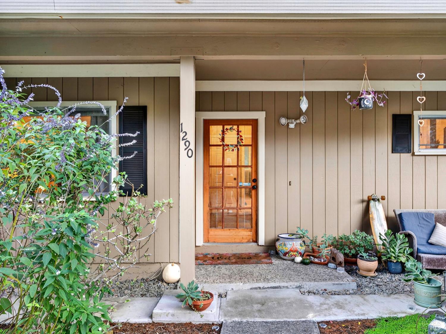 1290 Adobe Canyon Road Kenwood, CA 95452 - Photo 51 of 62 a front view of a house with plants