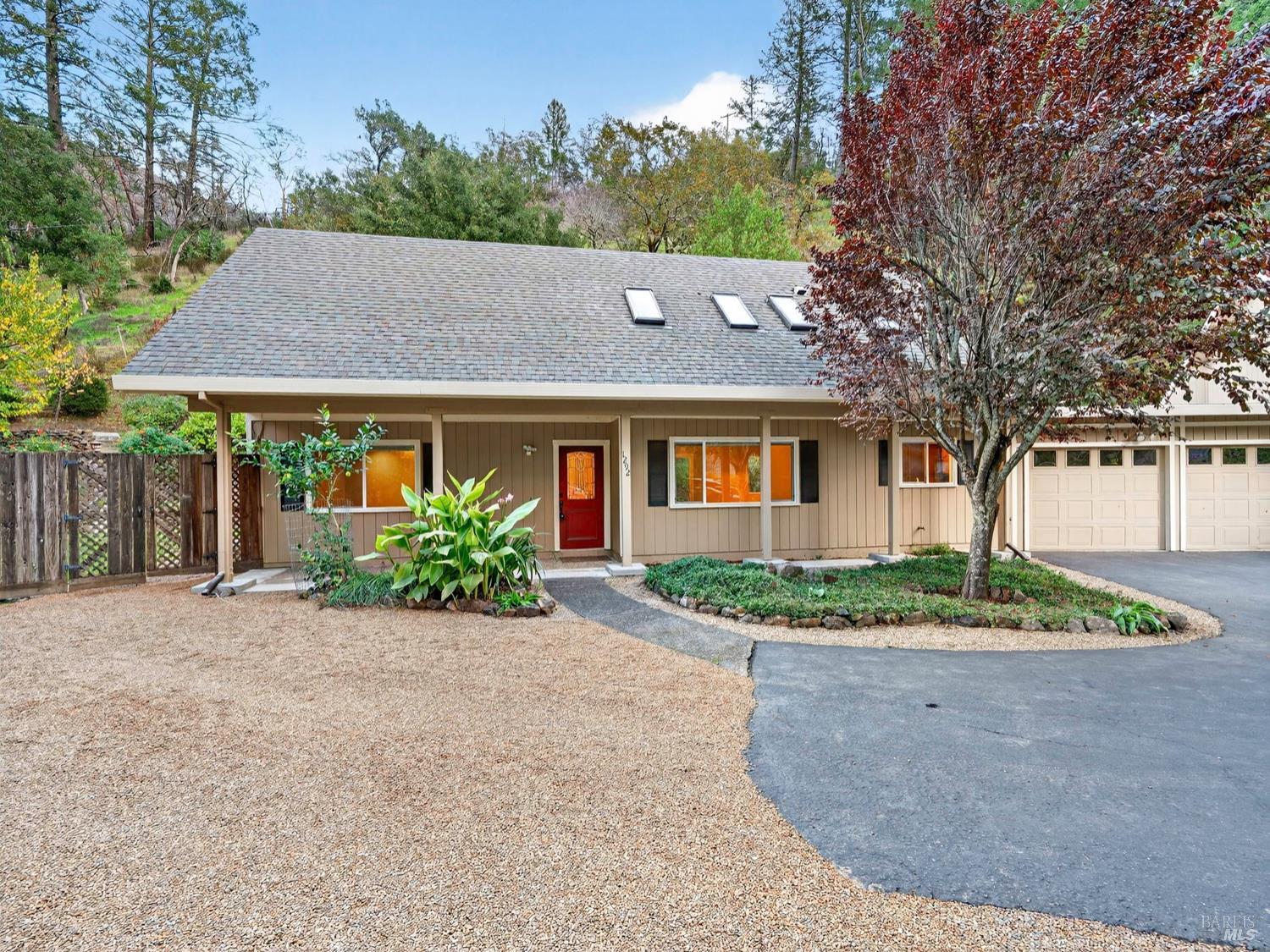 1290 Adobe Canyon Road Kenwood, CA 95452 - Photo 7 of 62 front view of a house with a yard