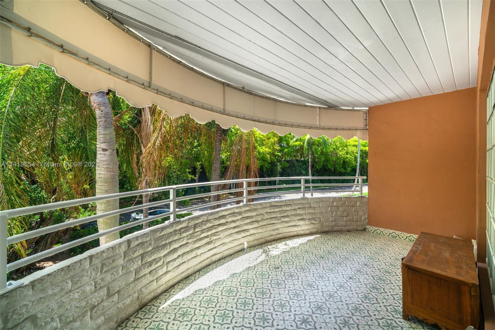 60 Park Drive, Unit D Bal Harbour, FL 33154 - Photo 11 of 11 a view of a room with wooden floor and windows