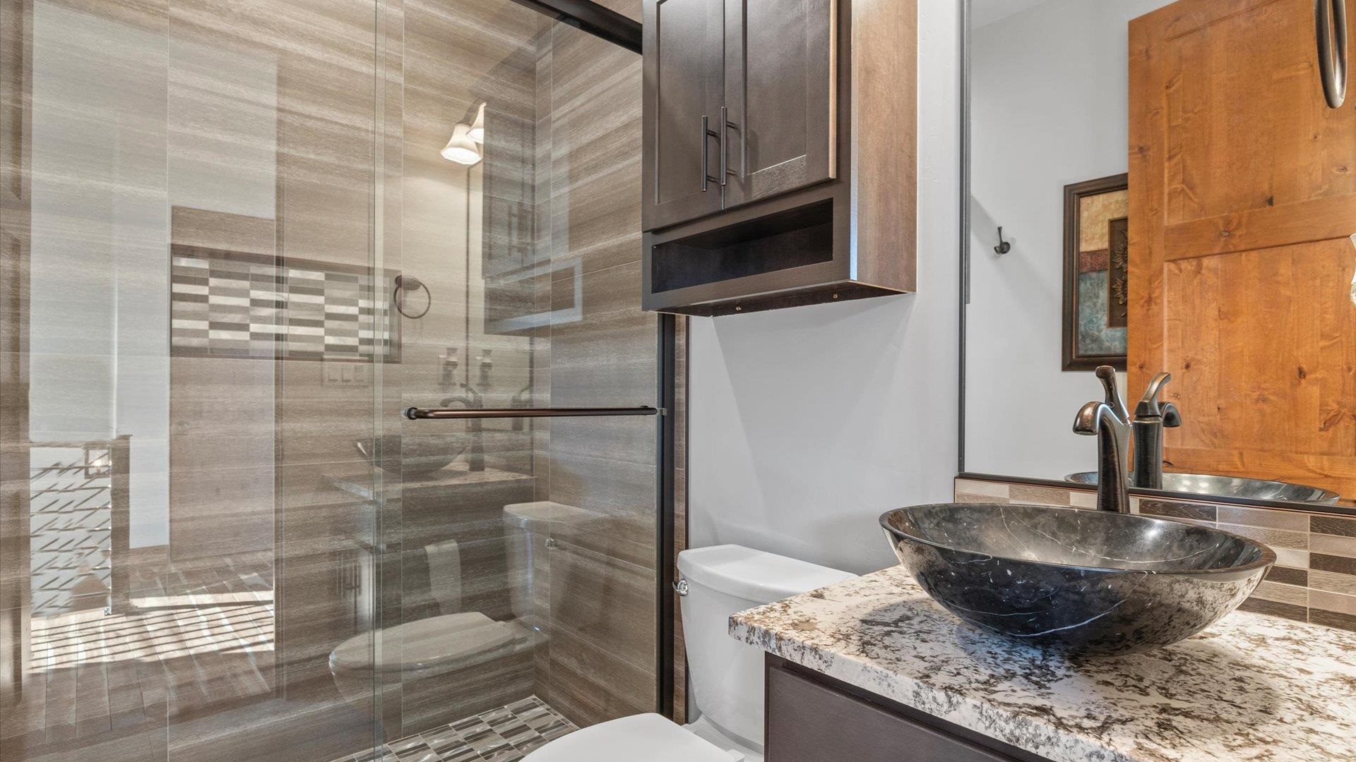 379 High Desert Road Grand Junction, CO 81507 - Photo 20 of 42 a close view of a sink and a mirror