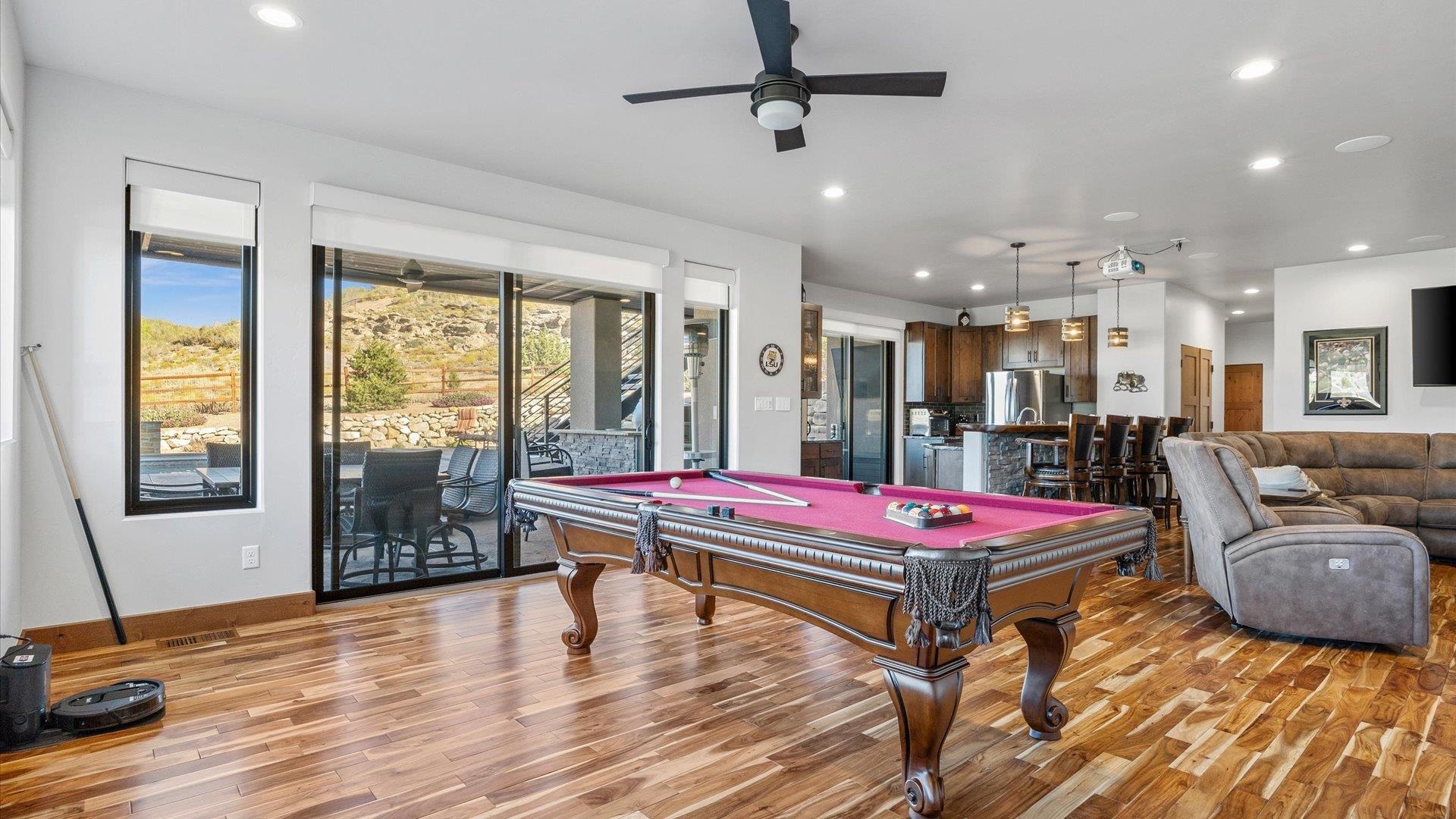 379 High Desert Road Grand Junction, CO 81507 - Photo 25 of 42 a room with pool table and windows