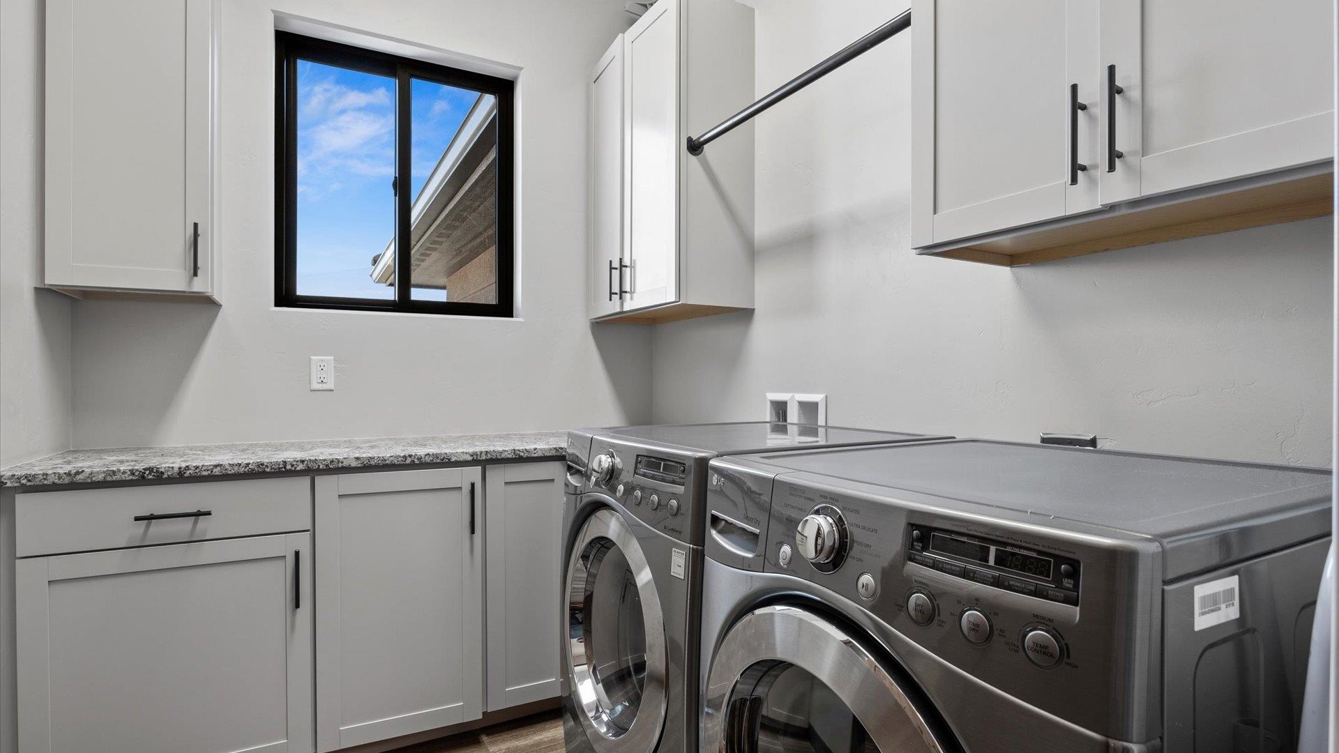 379 High Desert Road Grand Junction, CO 81507 - Photo 32 of 42 a utility room with dryer and washer
