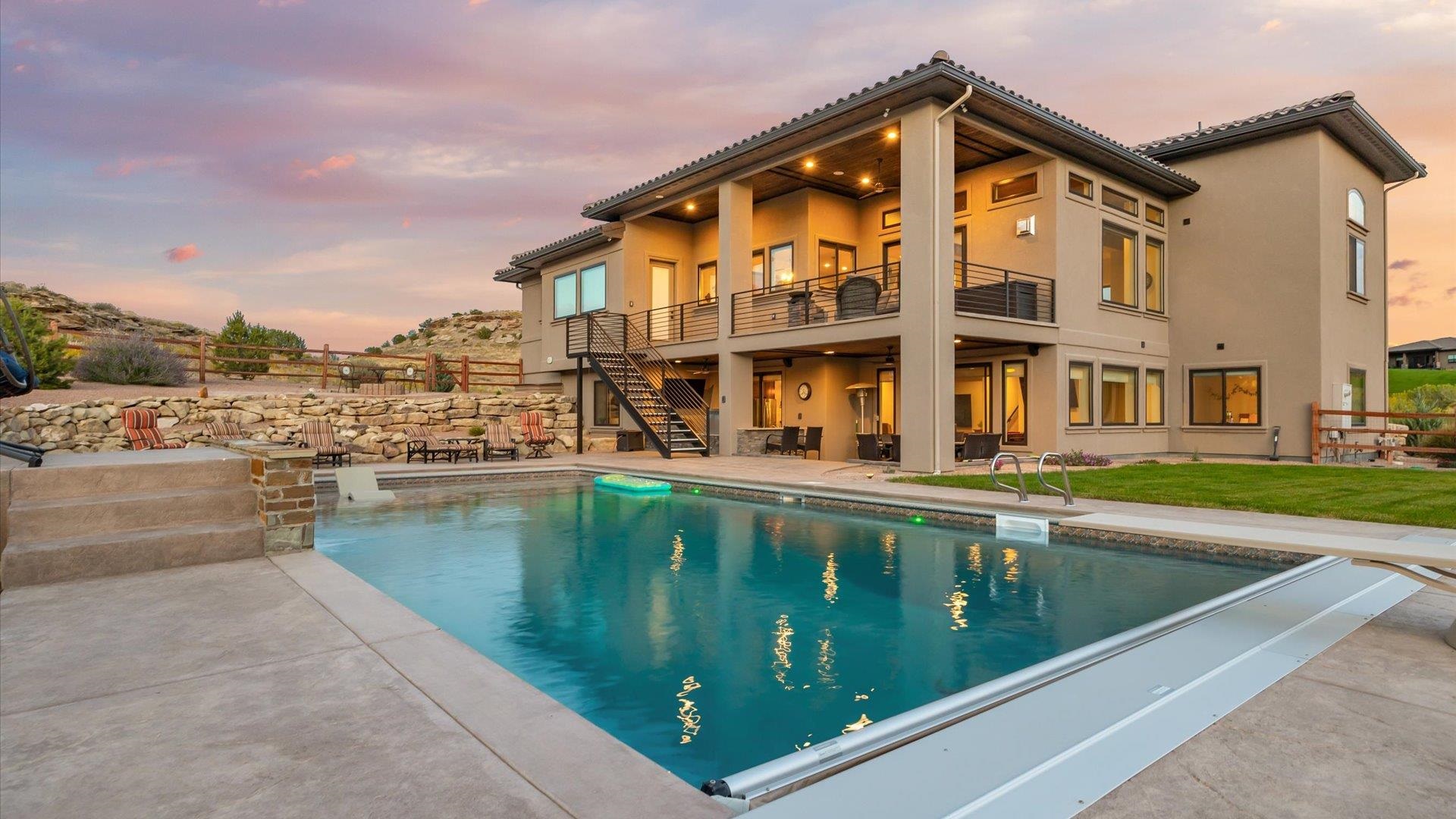 379 High Desert Road Grand Junction, CO 81507 - Photo 35 of 42 a view of a house with a swimming pool