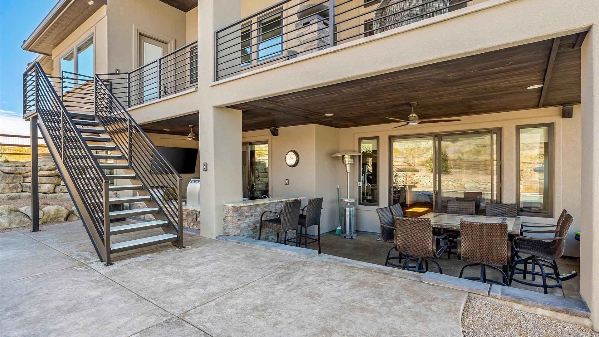 379 High Desert Road Grand Junction, CO 81507 - Photo 36 of 42 a view of a chairs and table in a patio