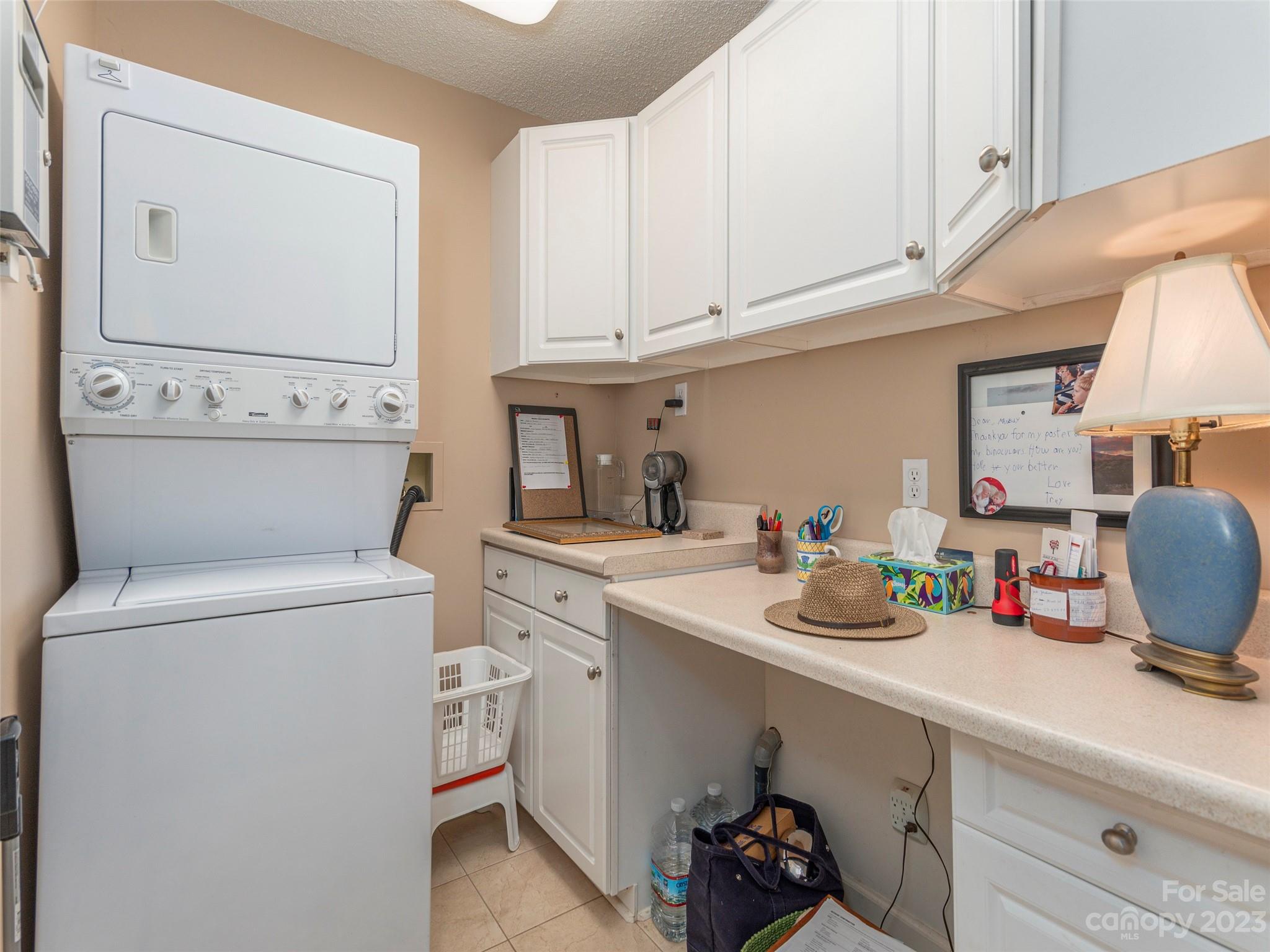 106 Beaver Ridge Road Asheville, NC 28804 - Photo 12 of 19 a kitchen with a sink cabinets and appliances