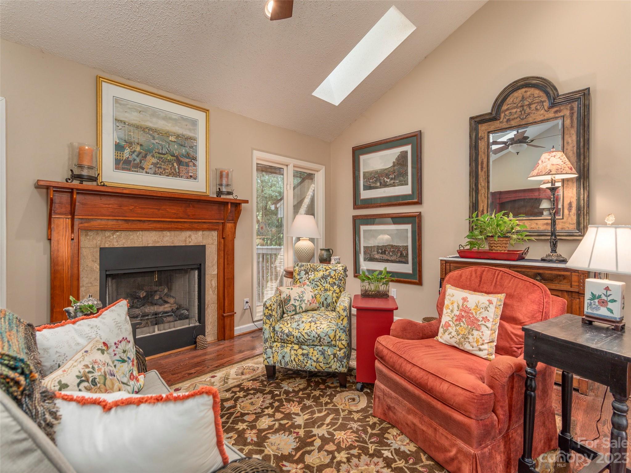 106 Beaver Ridge Road Asheville, NC 28804 - Photo 7 of 19 a living room with furniture and a fireplace