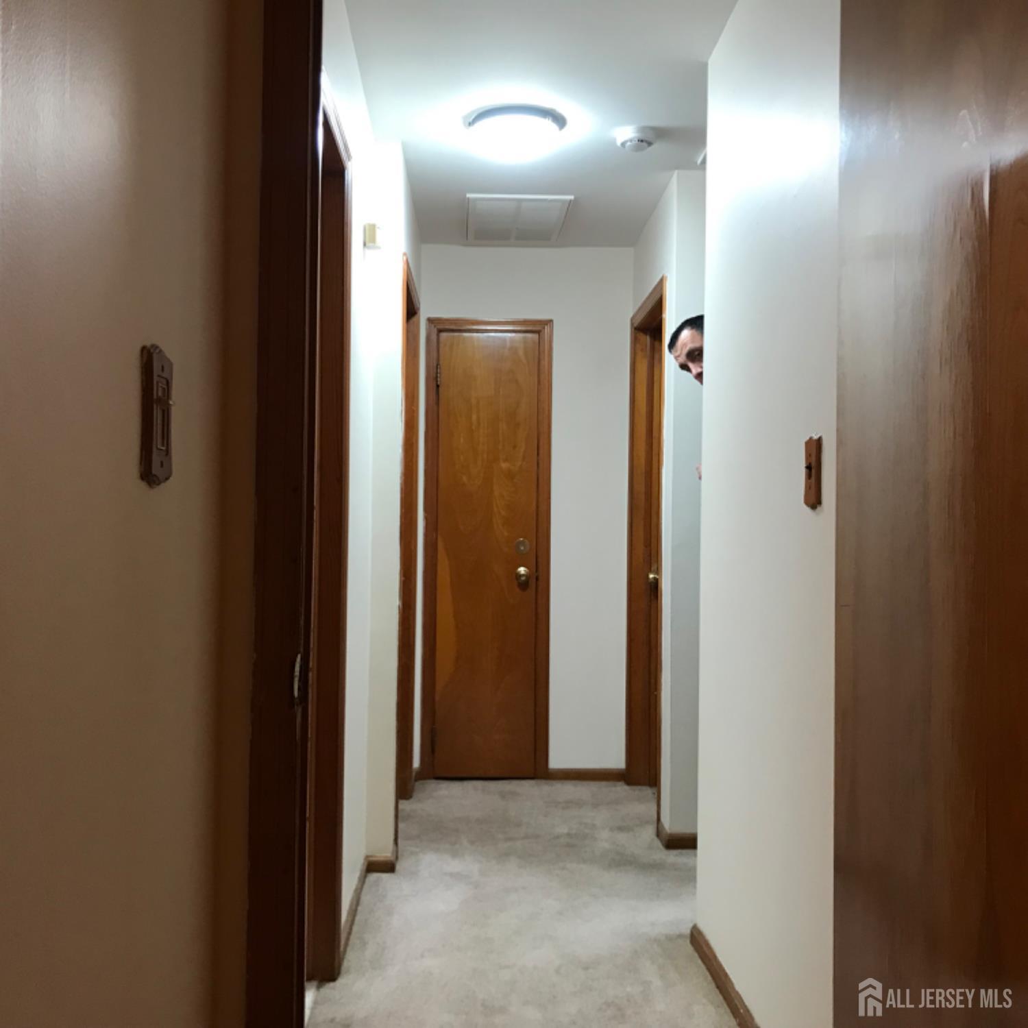 354 Alpine Street Perth Amboy, NJ 08861 - Photo 13 of 16 an entryway with a mirror