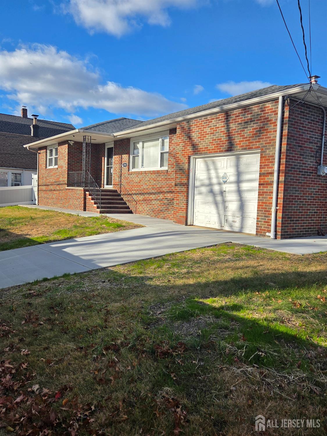 354 Alpine Street Perth Amboy, NJ 08861 - Photo 2 of 16 a view of a house with a swimming pool