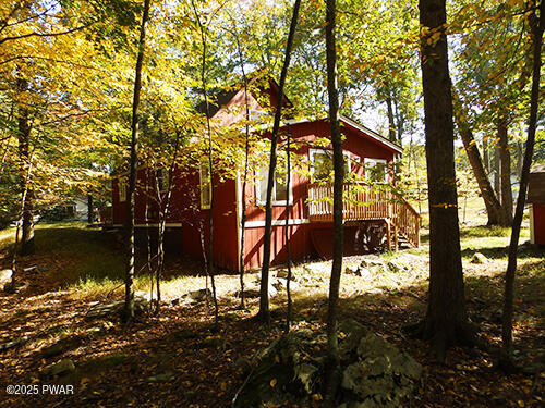 105 Roundhill Road Dingmans Ferry, PA 18328 - Photo 3 of 18 a view of yard