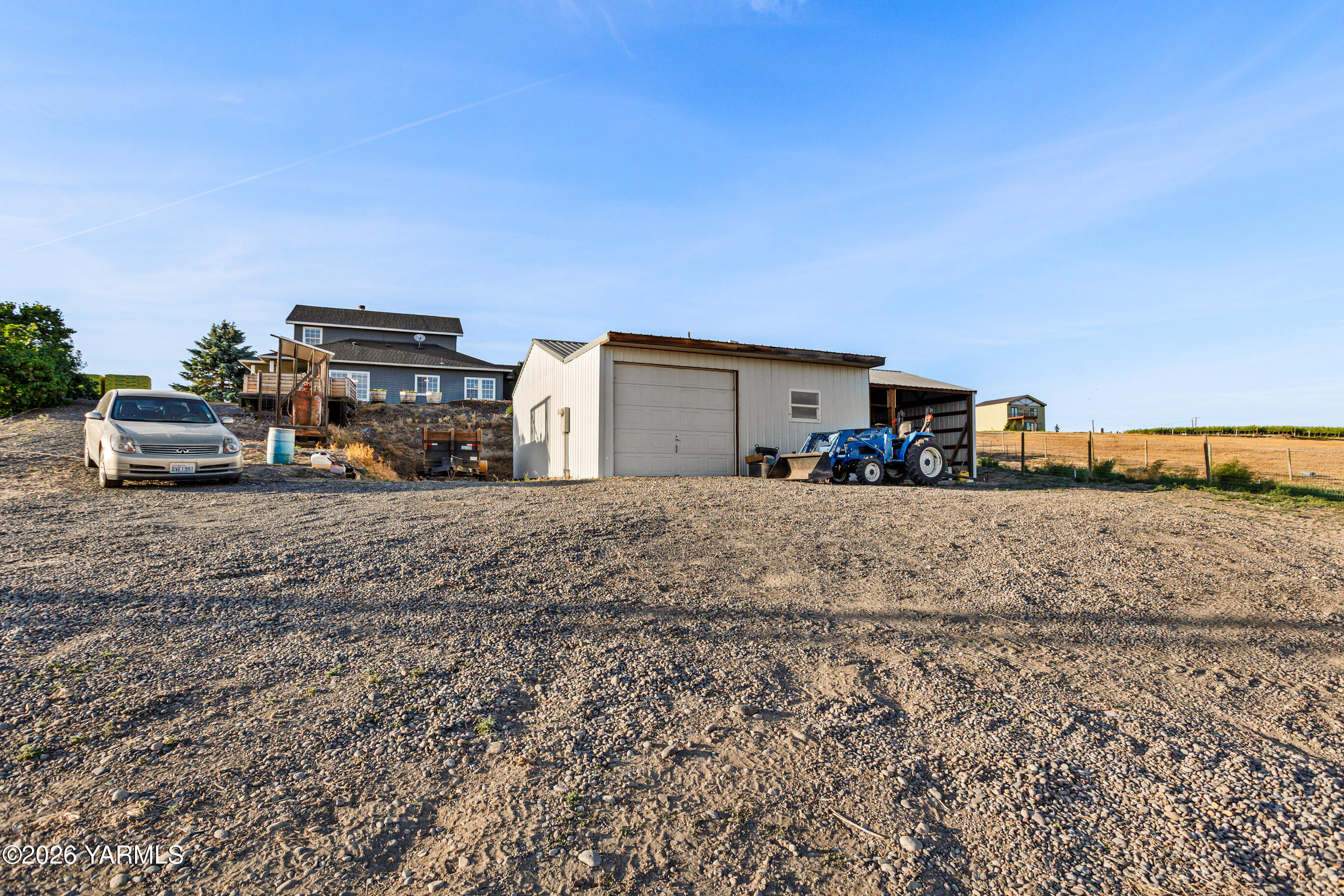 5060 Lombard Loop Road Zillah, WA 98953 - Photo 49 of 65 a view of car parked on the side of road