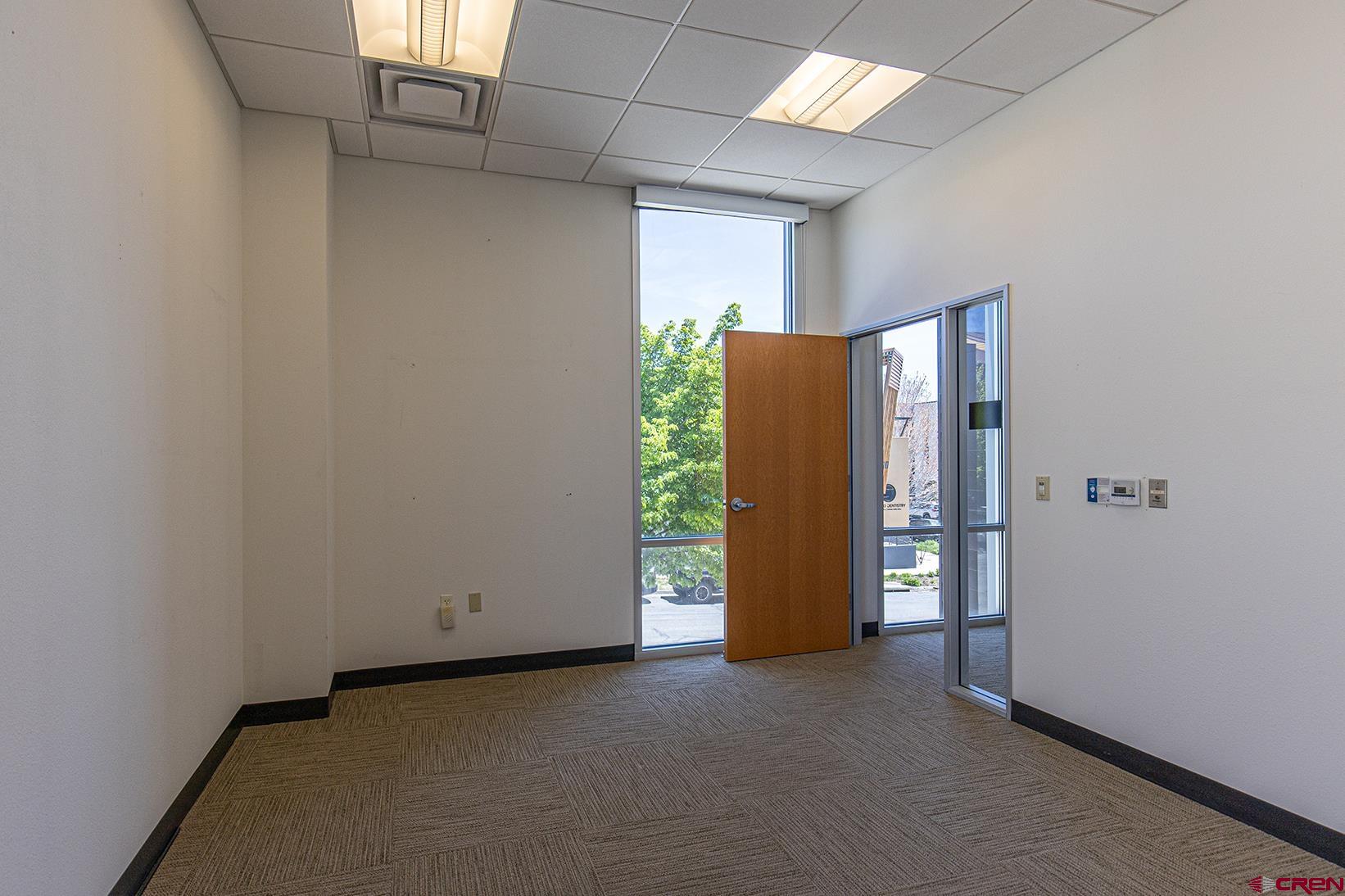 175 Mercado Street, Unit 234 Durango, CO 81301 - Photo 4 of 39 a view of an empty room with a window