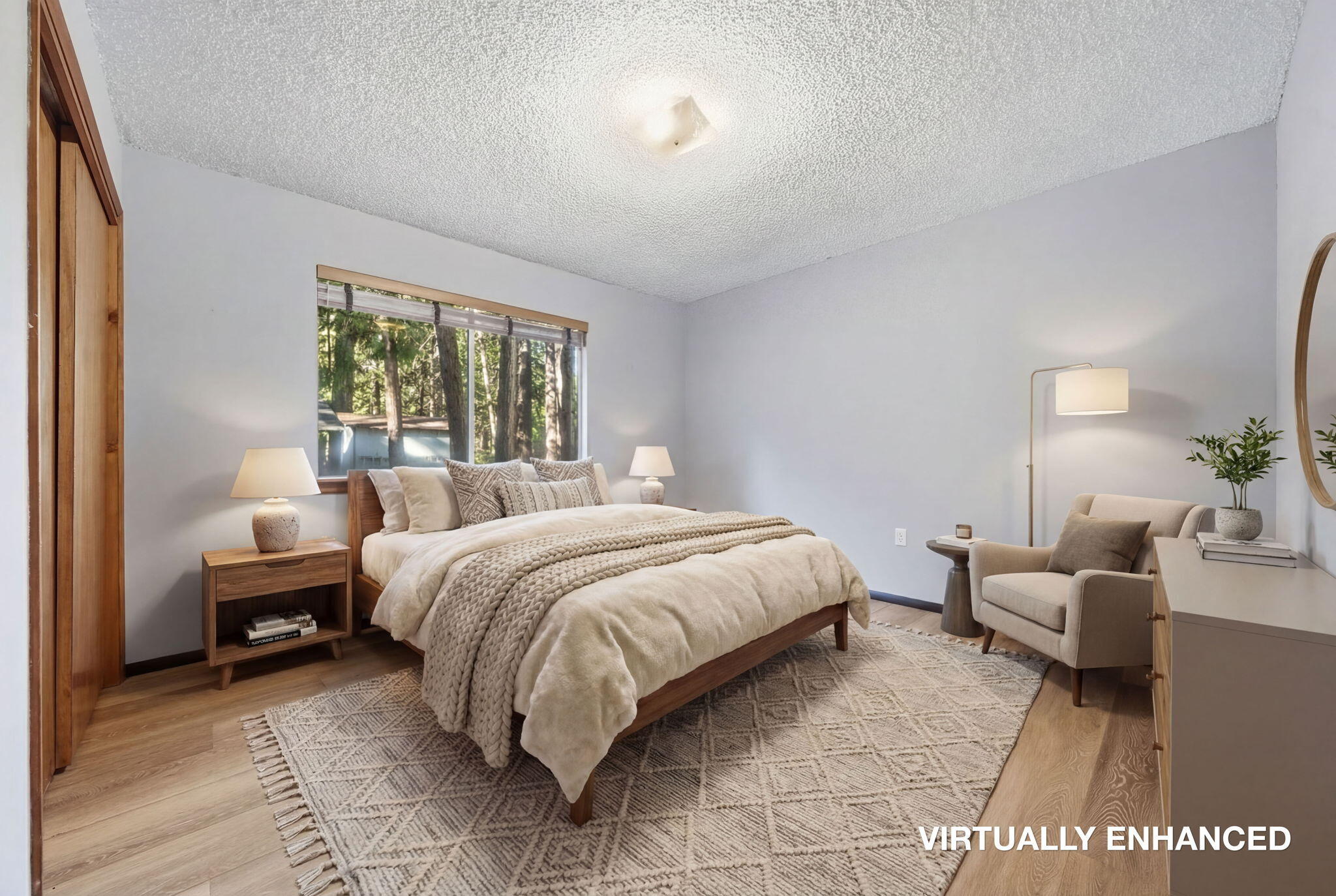 8489 Starlite Pines Road Shingletown, CA 96088 - Photo 14 of 26 a bedroom with a bed and a couch