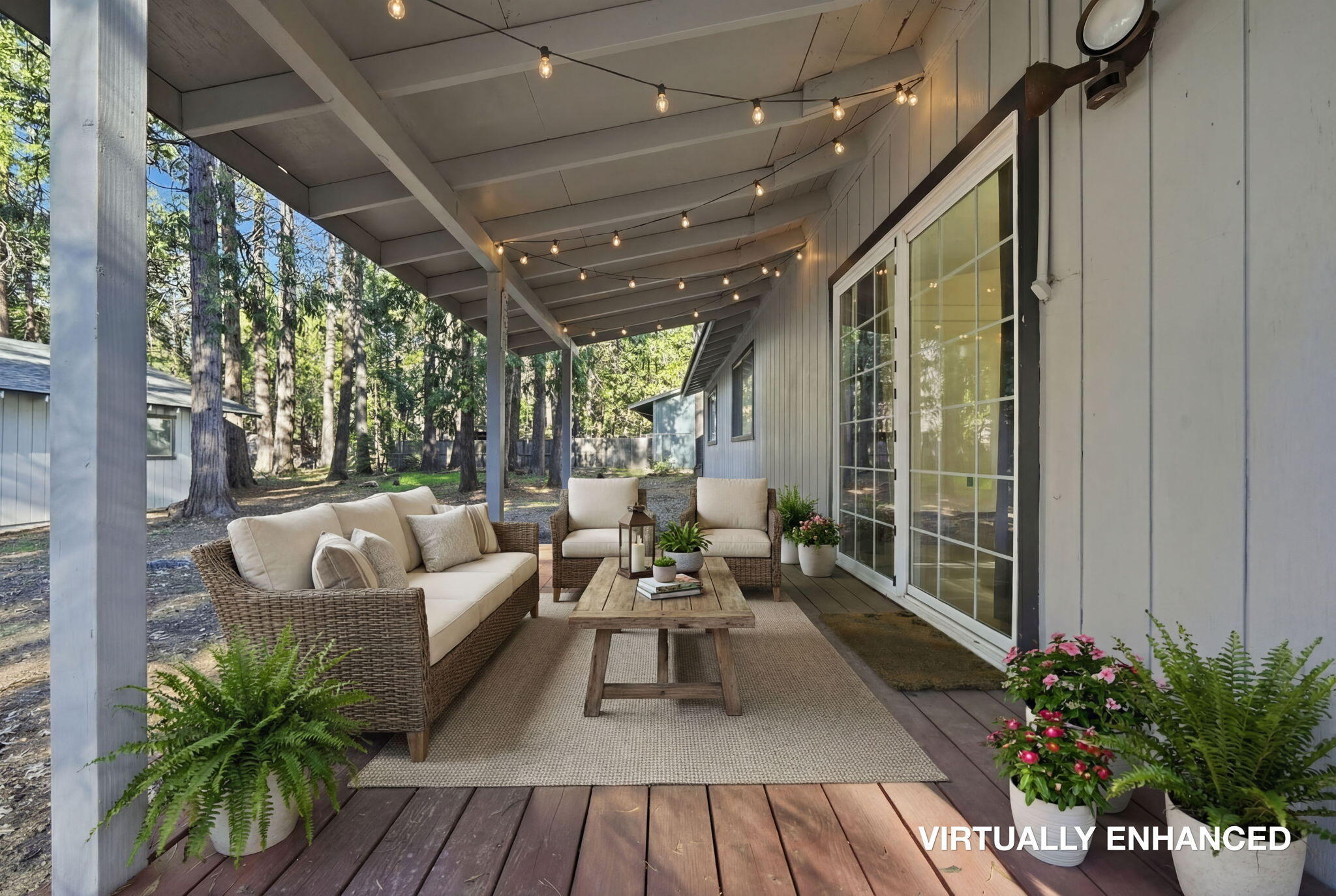 8489 Starlite Pines Road Shingletown, CA 96088 - Photo 17 of 26 a balcony with furniture and a potted plant