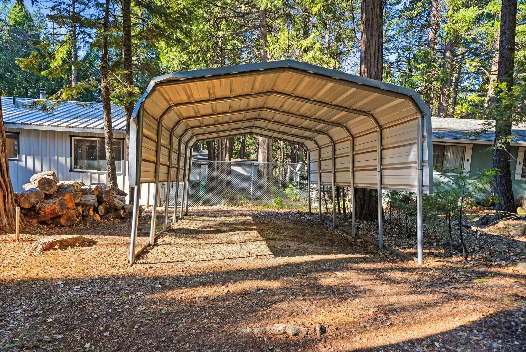 8489 Starlite Pines Road Shingletown, CA 96088 - Photo 26 of 26 a view of entrance gate of house