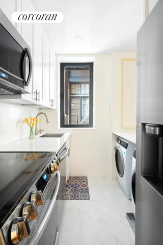 a bathroom with a sink a mirror and bathtub