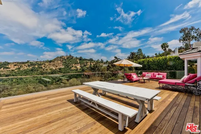 a view of a terrace with sitting area