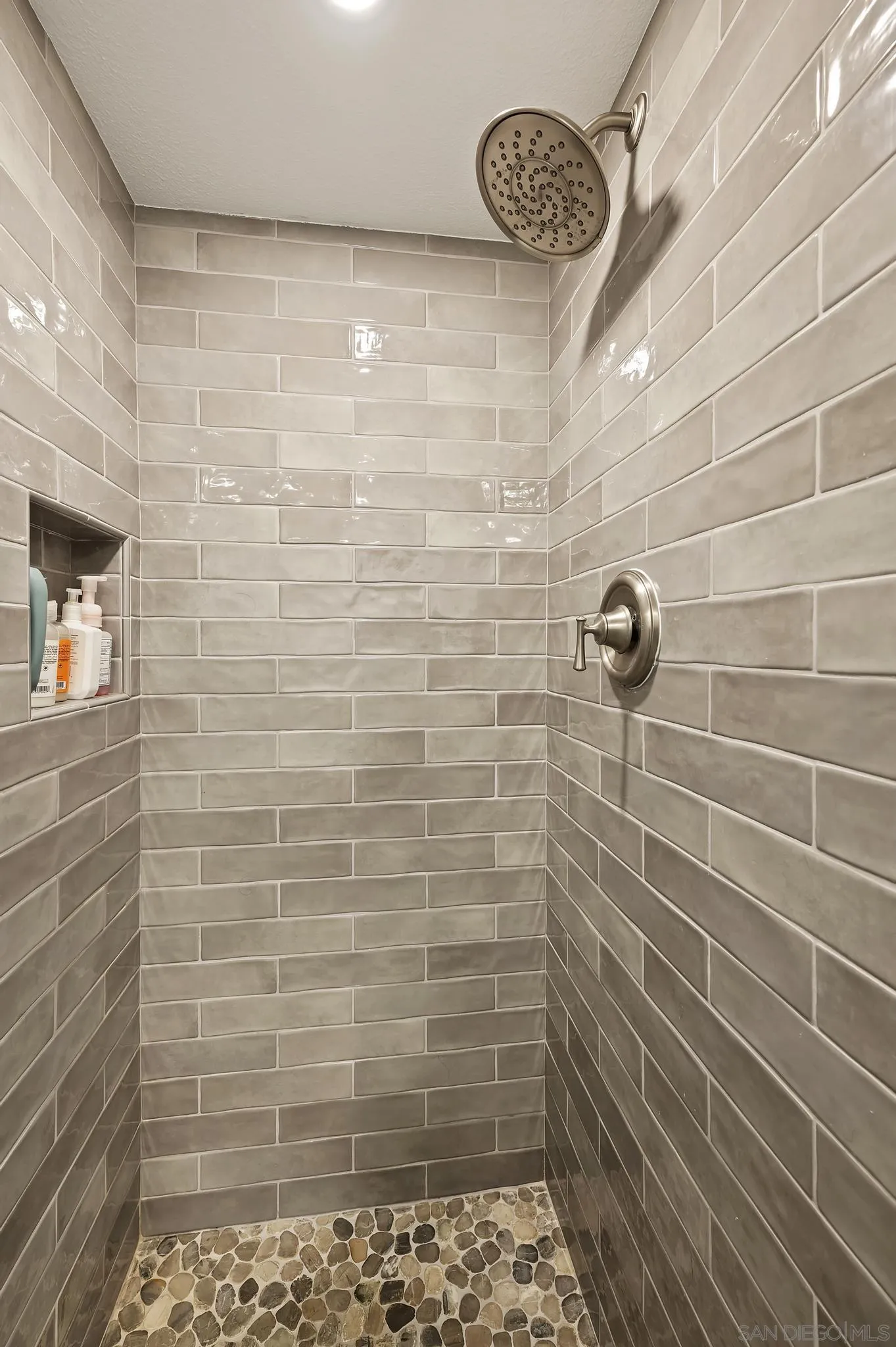 7015 Lavender Way Carlsbad, CA 92011 - Photo 17 of 67 a bathroom with a shower