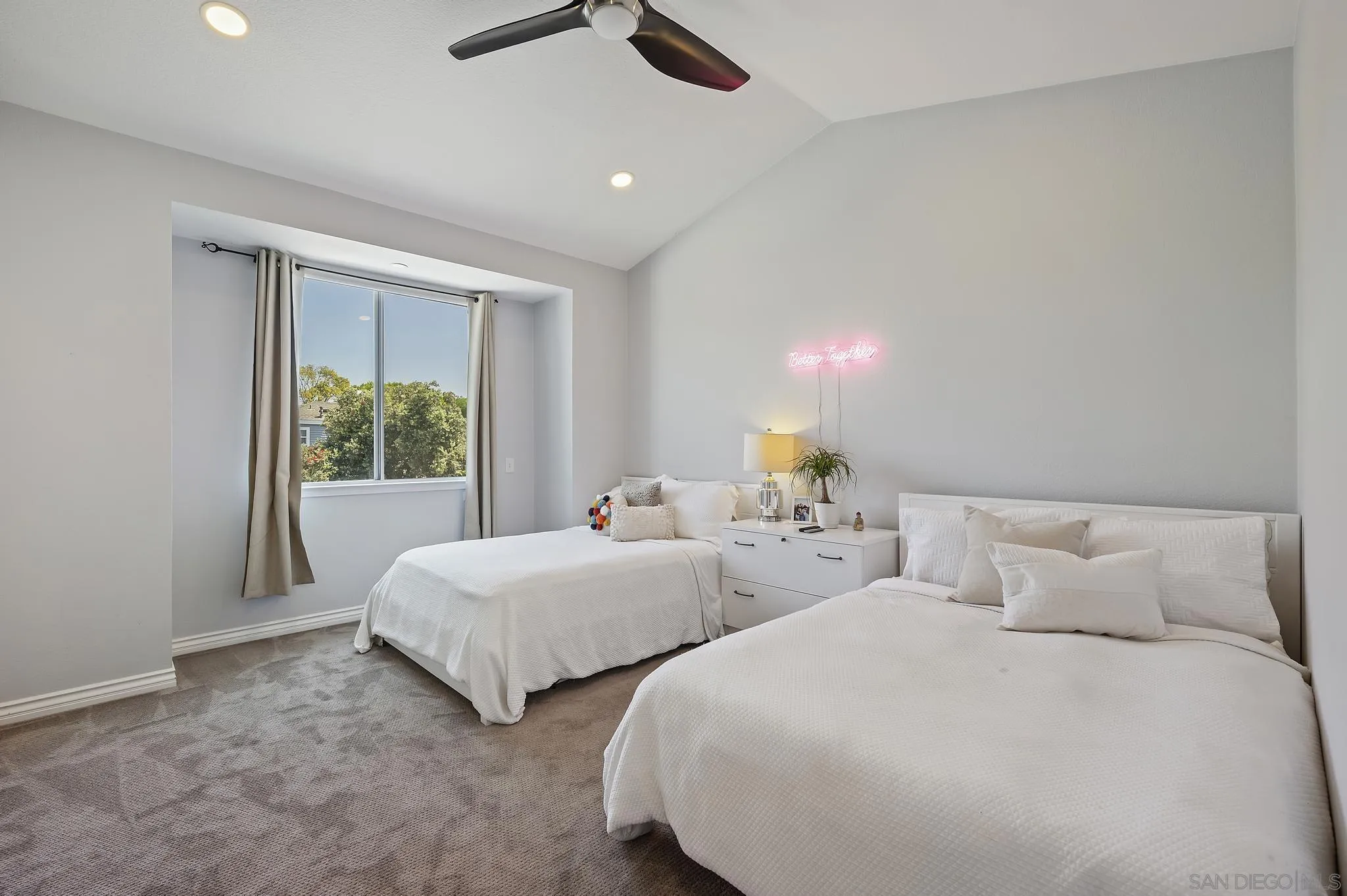 7015 Lavender Way Carlsbad, CA 92011 - Photo 22 of 67 a bedroom with two beds and painted walls
