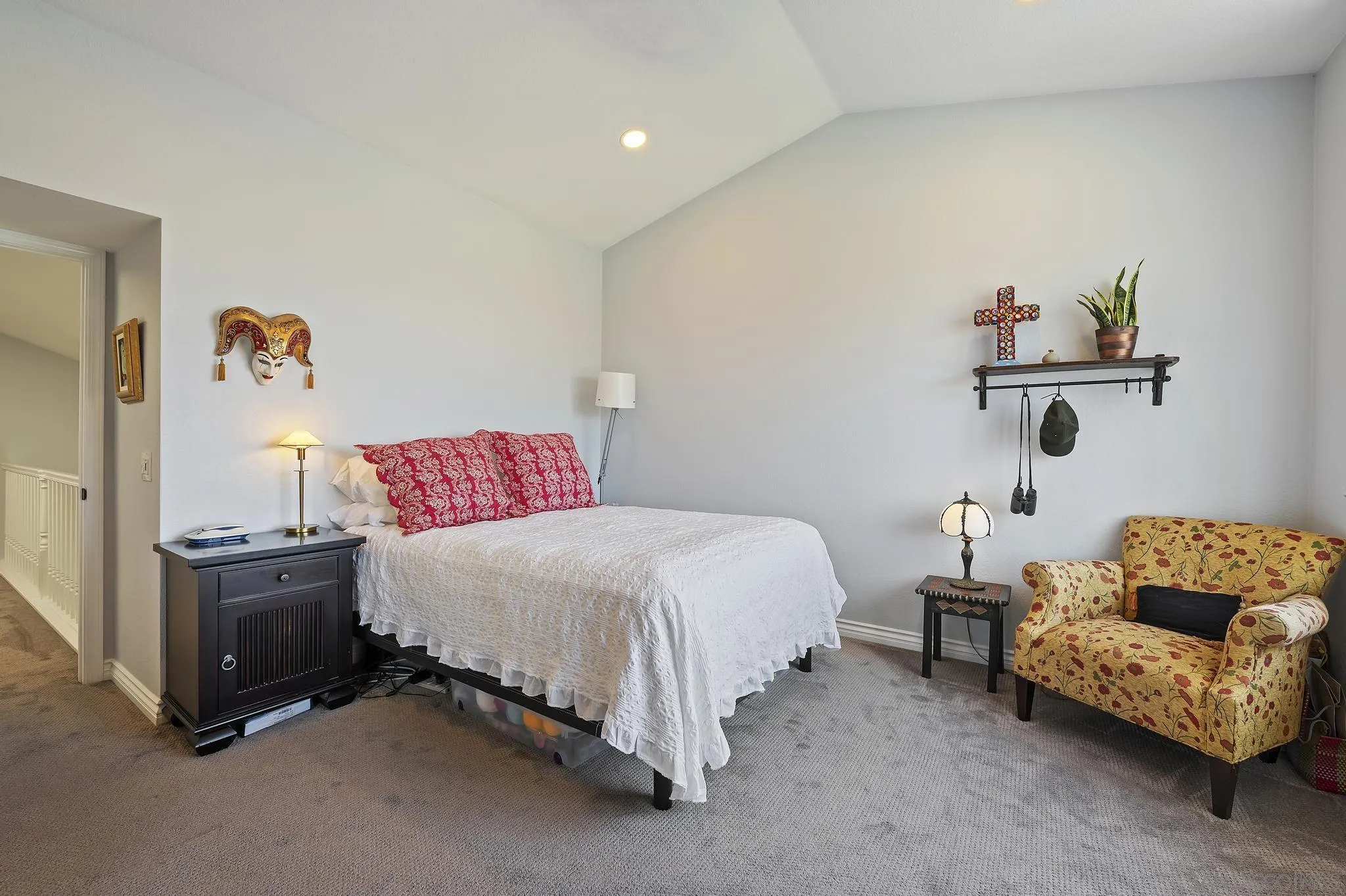 7015 Lavender Way Carlsbad, CA 92011 - Photo 26 of 67 a bedroom with a bed and a couch