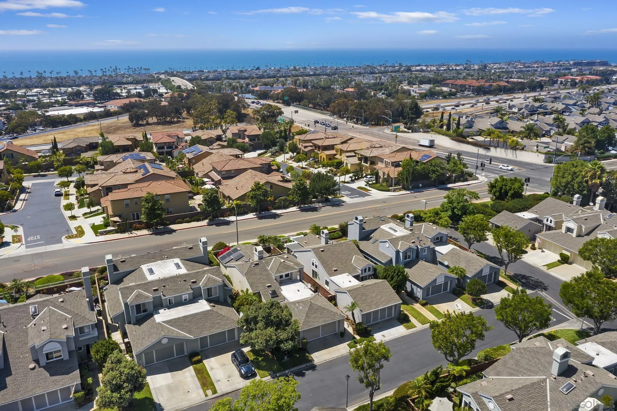 7015 Lavender Way Carlsbad, CA 92011 - Photo 36 of 67 an aerial view of a city with lots of residential buildings