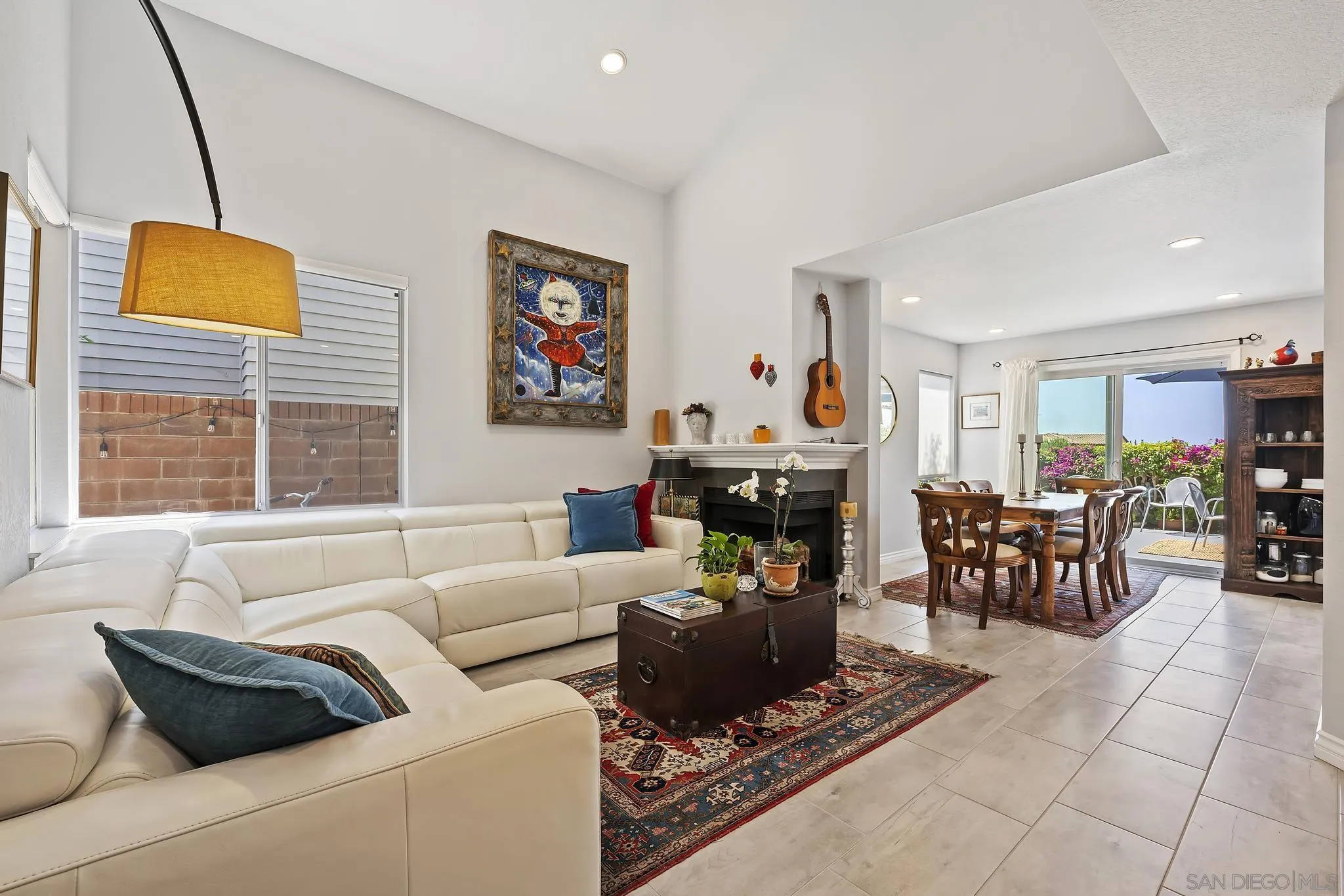 7015 Lavender Way Carlsbad, CA 92011 - Photo 4 of 67 a living room with furniture and a flat screen tv