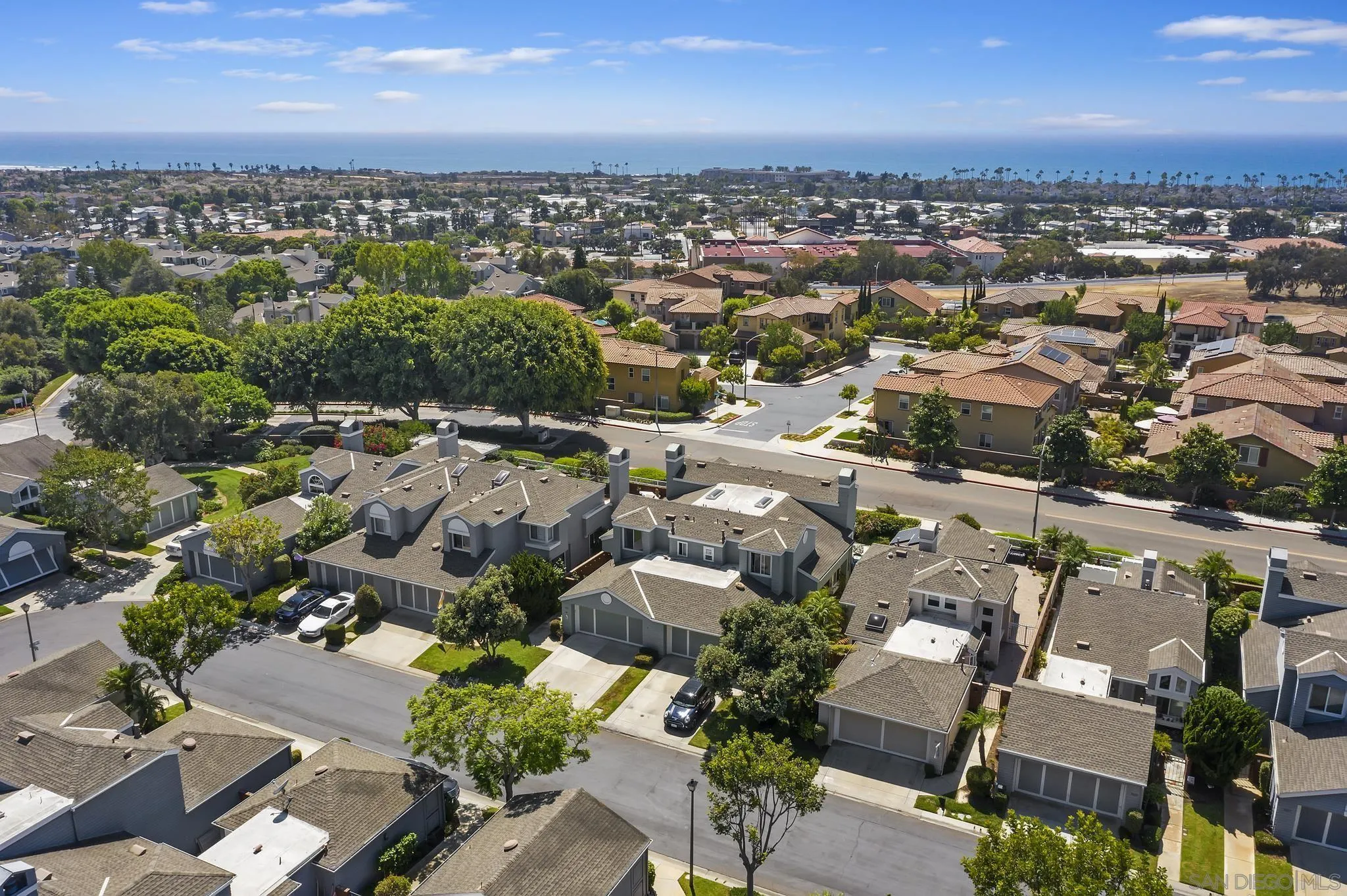 7015 Lavender Way Carlsbad, CA 92011 - Photo 41 of 67 an aerial view of a city with lots of residential buildings