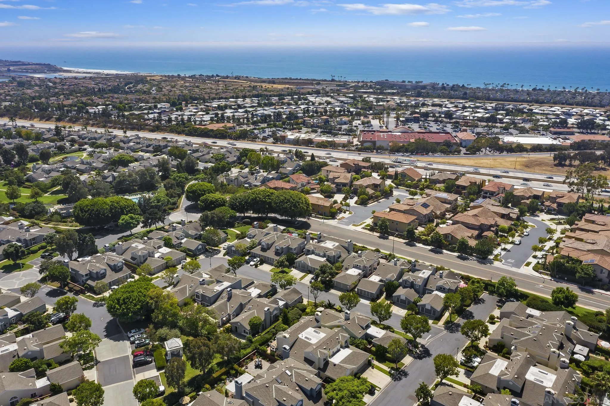 7015 Lavender Way Carlsbad, CA 92011 - Photo 42 of 67 an aerial view of a city with lots of residential buildings