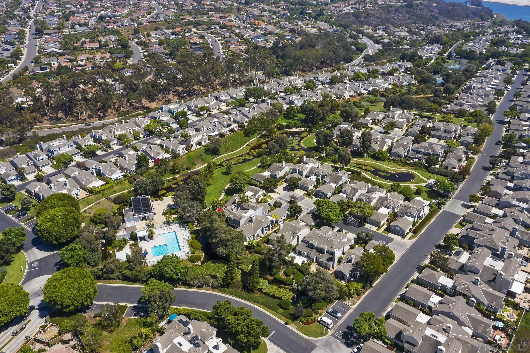 7015 Lavender Way Carlsbad, CA 92011 - Photo 46 of 67 an aerial view of residential houses with outdoor space