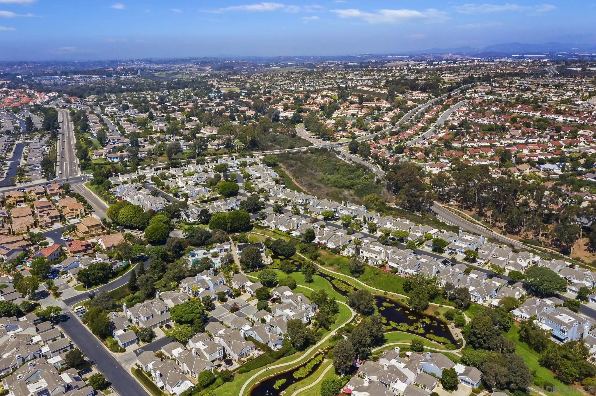 7015 Lavender Way Carlsbad, CA 92011 - Photo 49 of 67 an aerial view of residential houses with city view