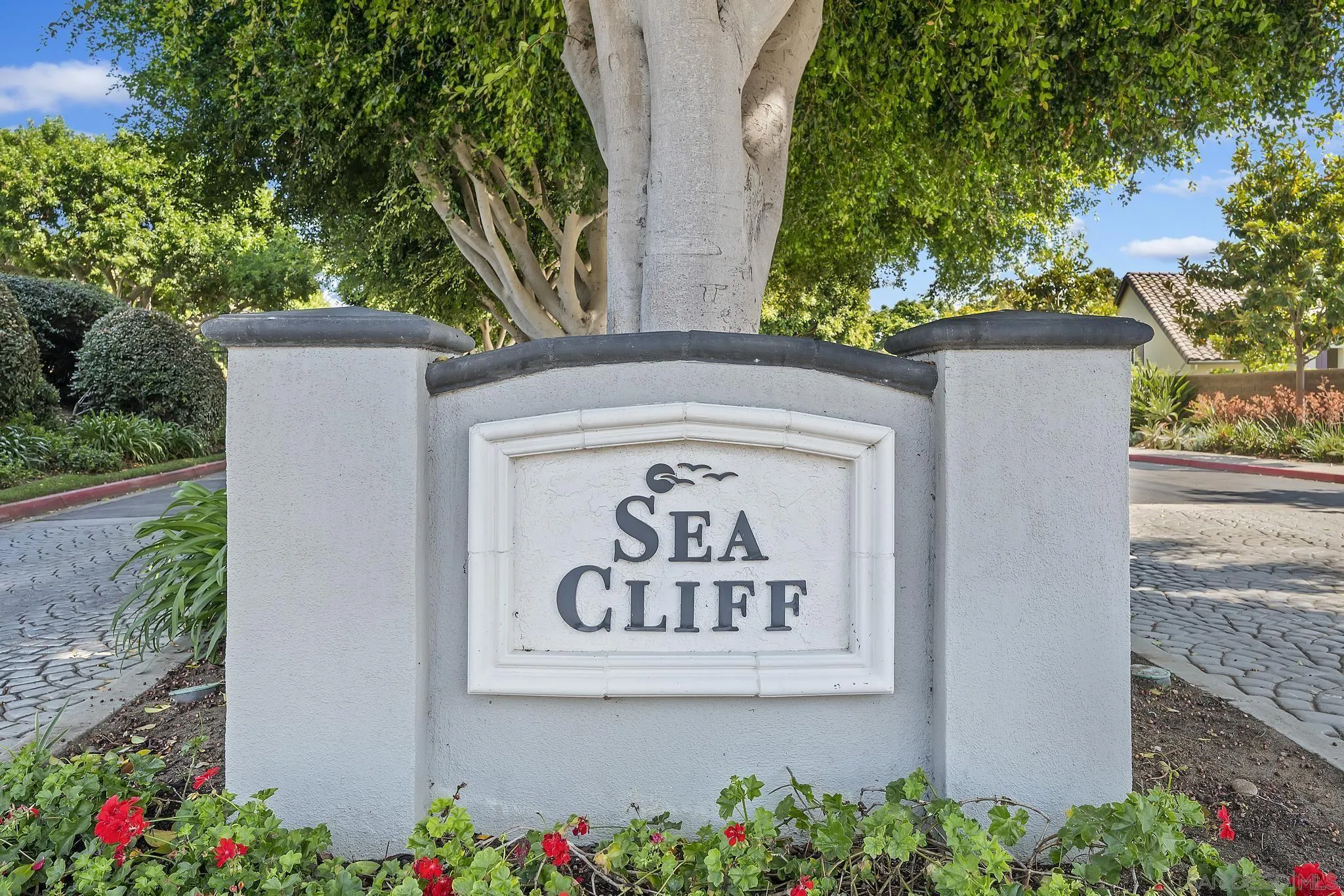 7015 Lavender Way Carlsbad, CA 92011 - Photo 67 of 67 a sign on the side of a building