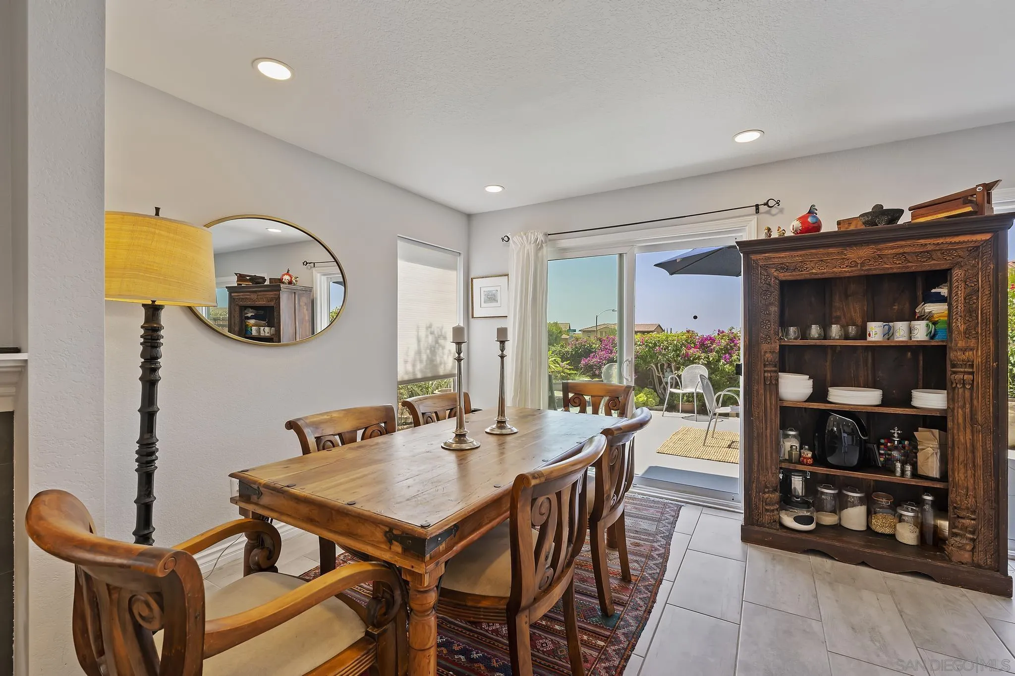7015 Lavender Way Carlsbad, CA 92011 - Photo 7 of 67 a view of a dining room with furniture and window