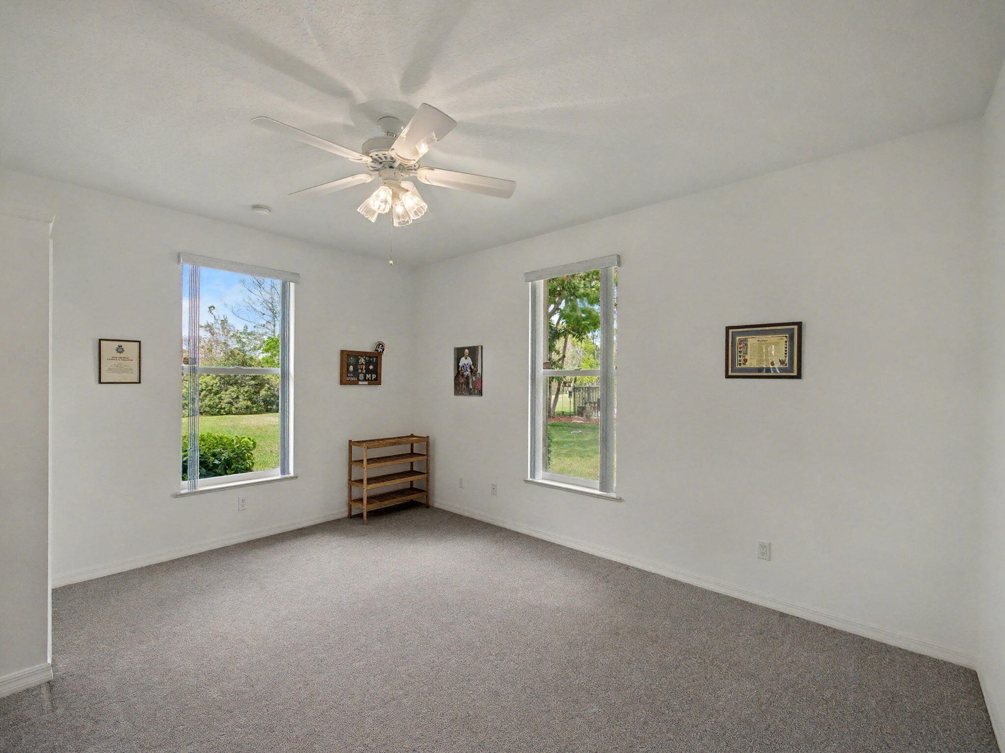 8122 Southwest Yachtsmans Drive Stuart, FL 34997 - Photo 27 of 43 a view of an empty room with a window