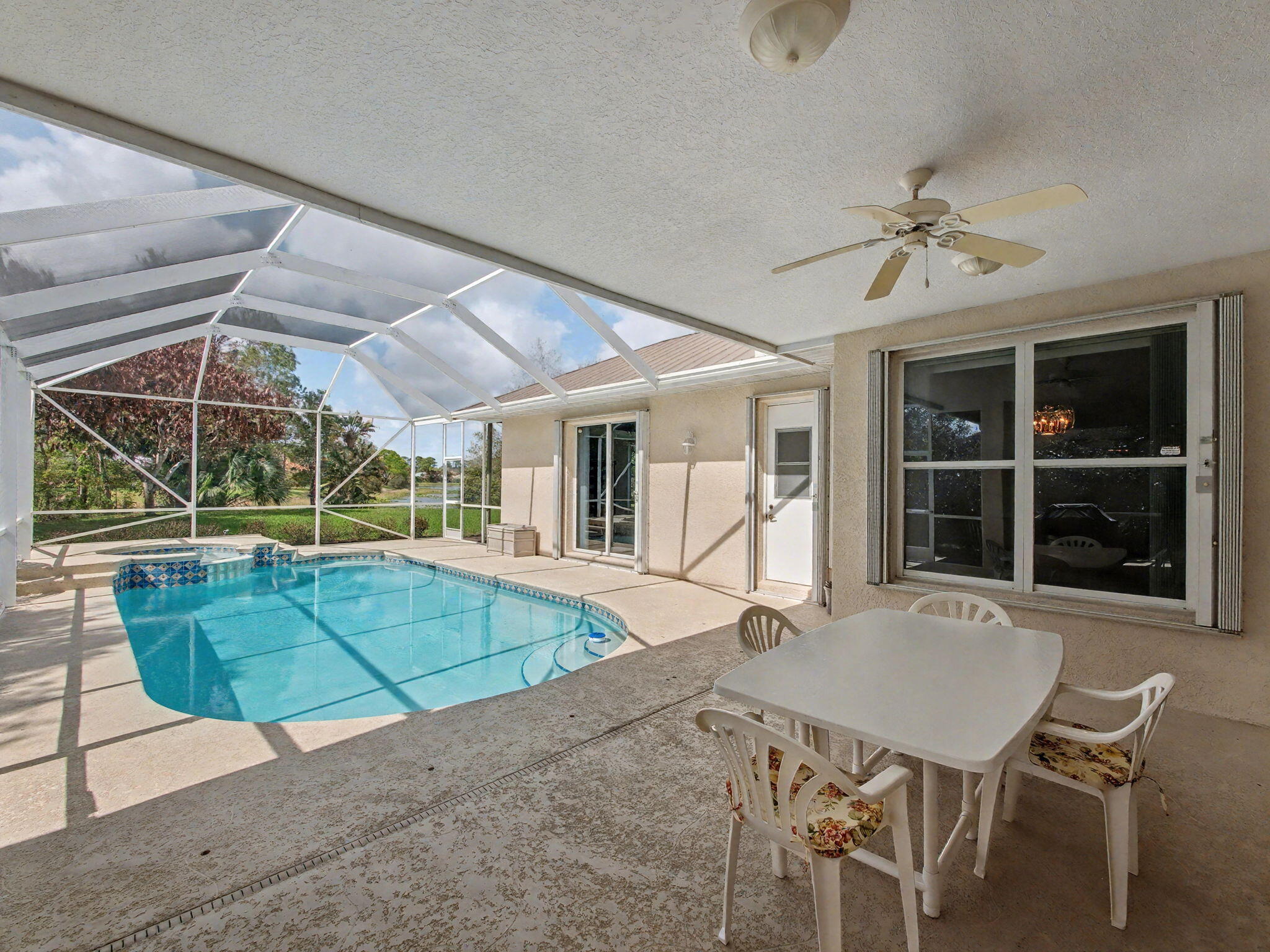 8122 Southwest Yachtsmans Drive Stuart, FL 34997 - Photo 29 of 43 a view of a house and a patio