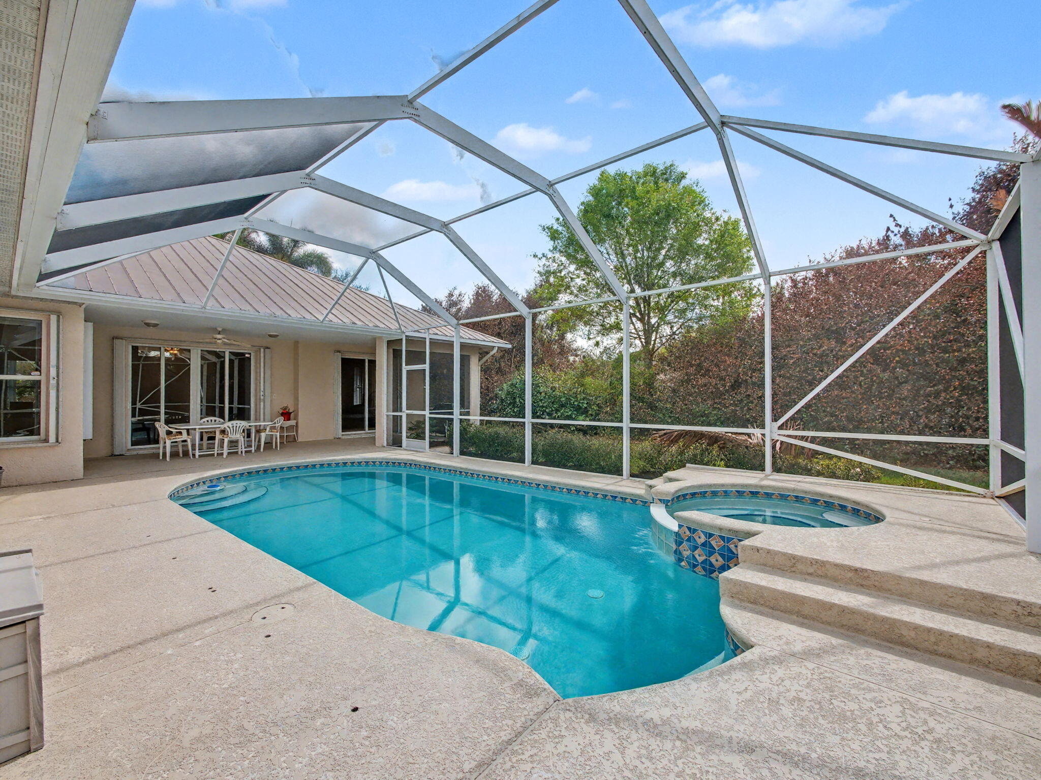8122 Southwest Yachtsmans Drive Stuart, FL 34997 - Photo 33 of 43 a view of indoor pool and deck