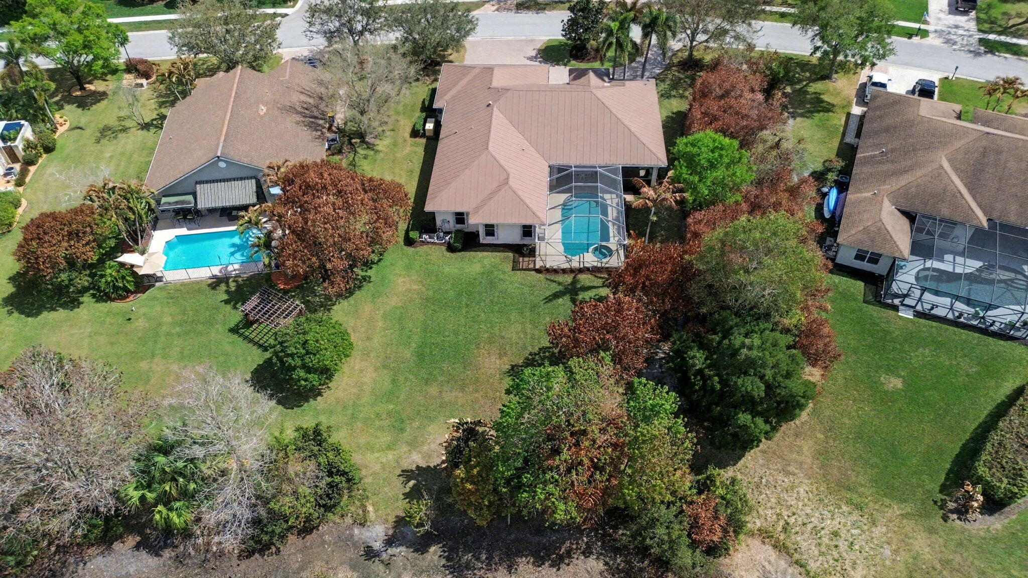 8122 Southwest Yachtsmans Drive Stuart, FL 34997 - Photo 42 of 43 an aerial view of a house with a garden