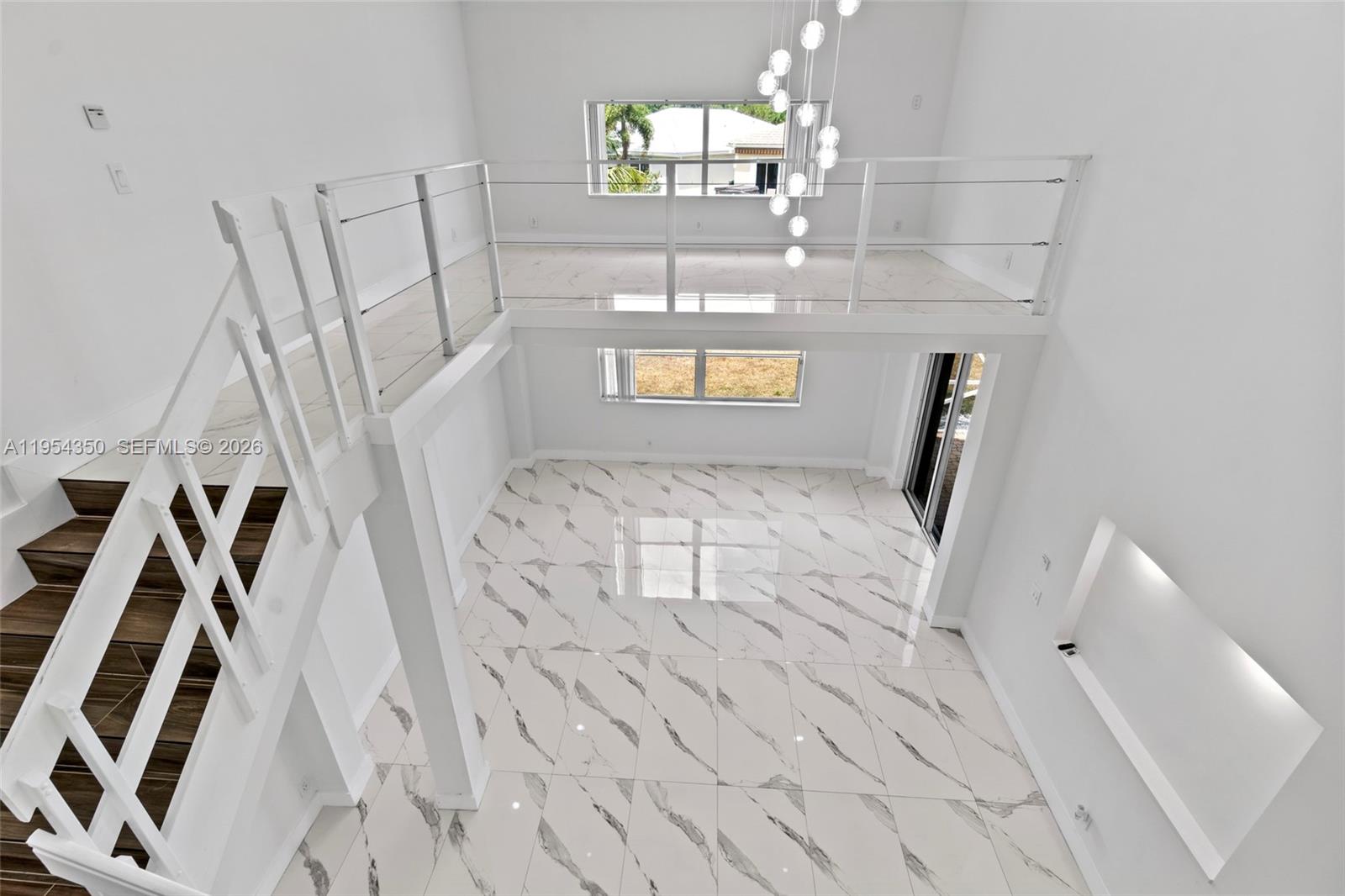 6357 Brava Way, Unit 6357 Boca Raton, FL 33433 - Photo 11 of 45 An eleveated space that adds dimension, light, and endless possibilities to the heart of the home.