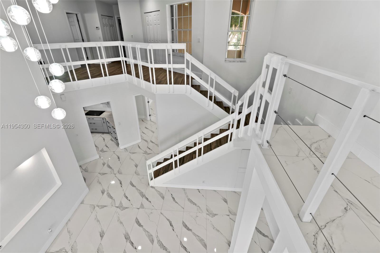 6357 Brava Way, Unit 6357 Boca Raton, FL 33433 - Photo 12 of 45 An eleveated space that adds dimension, light, and endless possibilities to the heart of the home.