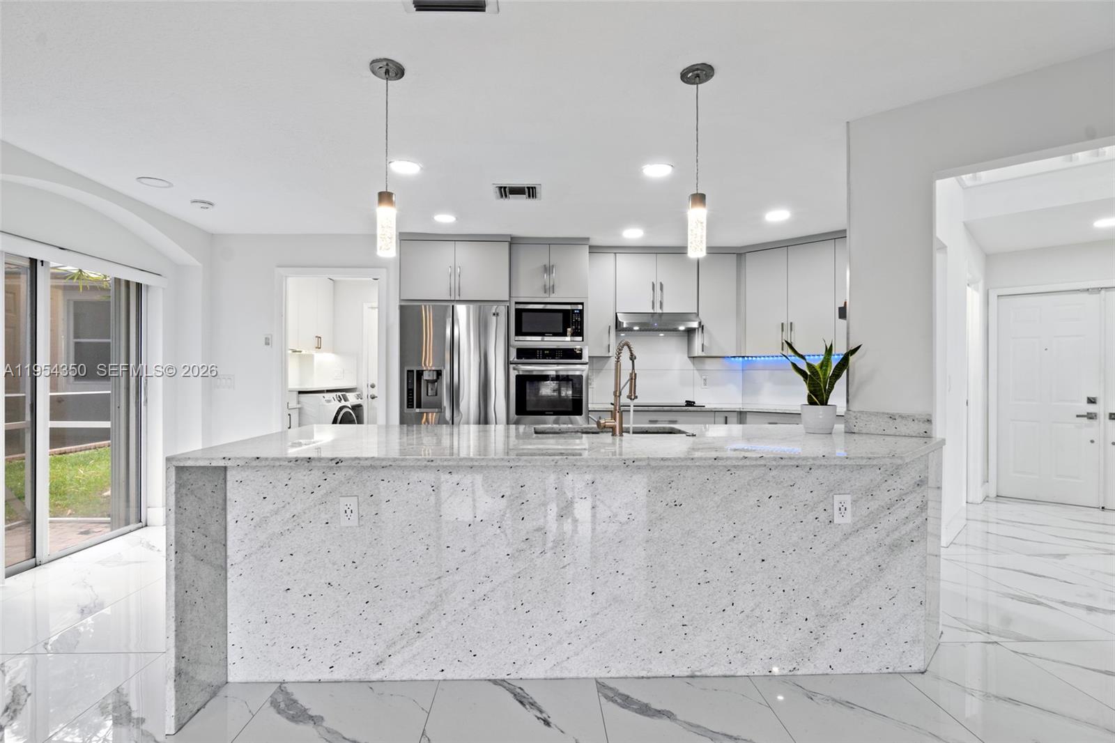 6357 Brava Way, Unit 6357 Boca Raton, FL 33433 - Photo 16 of 45 This kitchen serves up hugs, conversations, and exceptional meals.