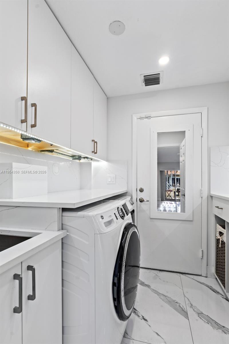 6357 Brava Way, Unit 6357 Boca Raton, FL 33433 - Photo 17 of 45 Step into organization and ease with every load