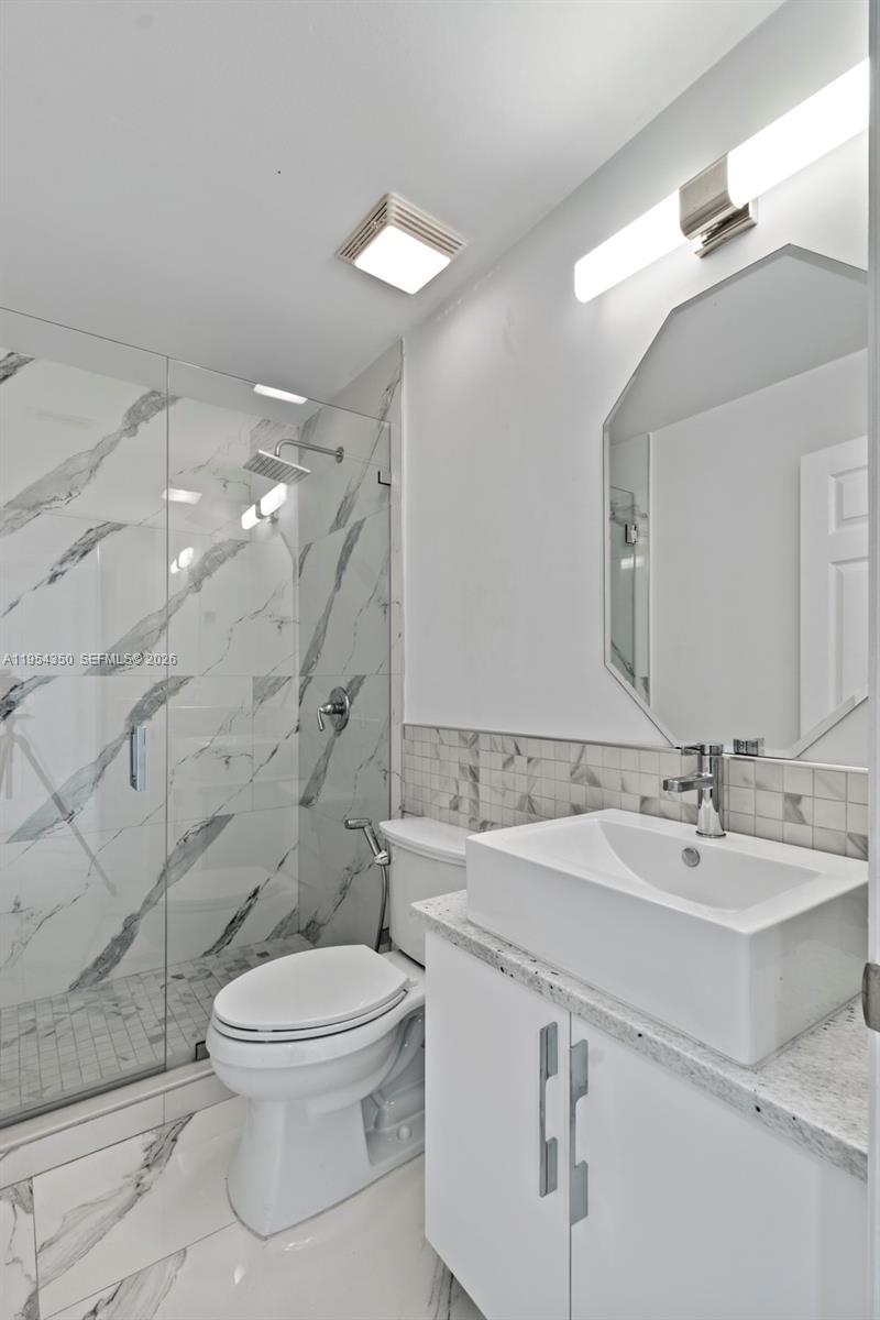 6357 Brava Way, Unit 6357 Boca Raton, FL 33433 - Photo 37 of 45 Bathroom Four within Mini-Suite