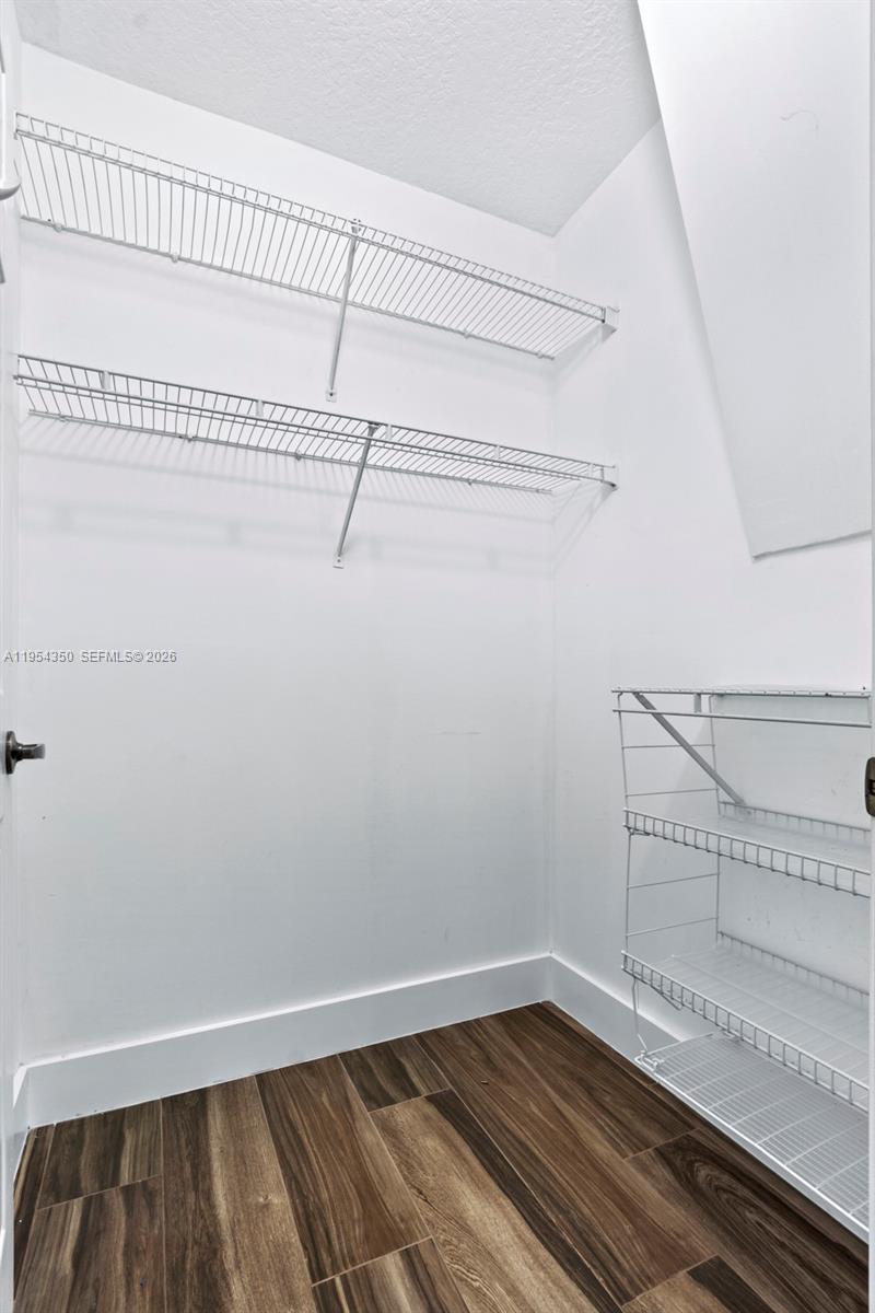 6357 Brava Way, Unit 6357 Boca Raton, FL 33433 - Photo 38 of 45 Bedroom Four walk-in closet