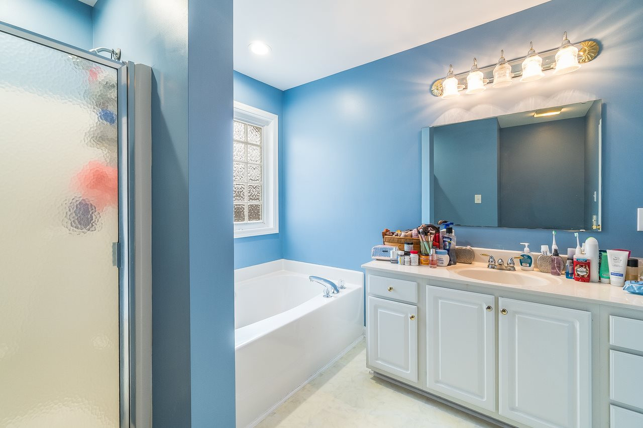 5712 Novaglen Road Durham, NC 27712 - Photo 14 of 27 Master bath has dual vanities, separate shower, and soaking tub! Master Bath/Spa