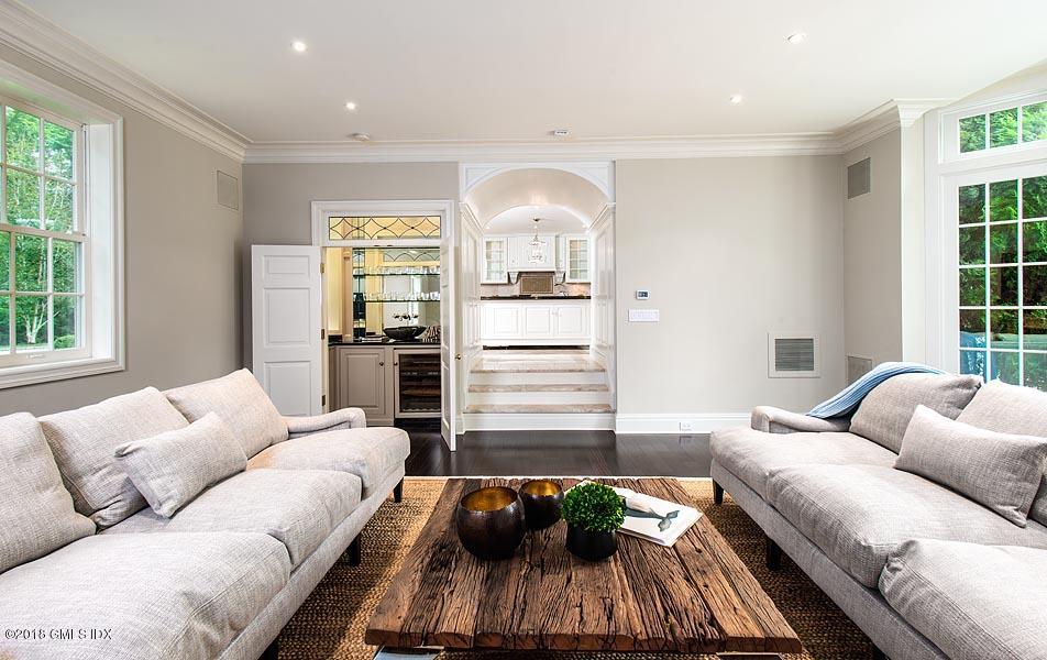 2 Round Hill Road Greenwich, CT 06831 - Photo 15 of 34 a living room with furniture and a large window