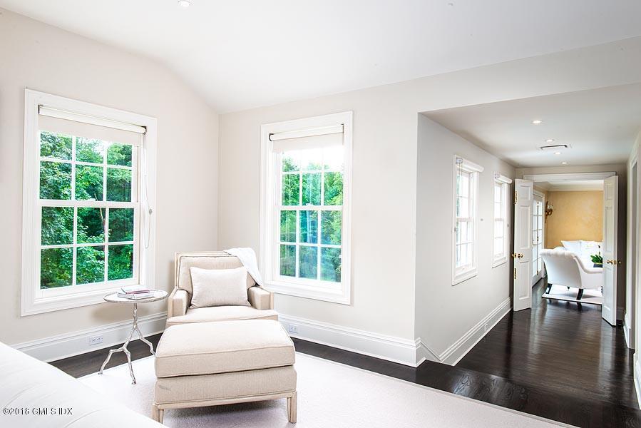 2 Round Hill Road Greenwich, CT 06831 - Photo 18 of 34 a living room with furniture and a large window