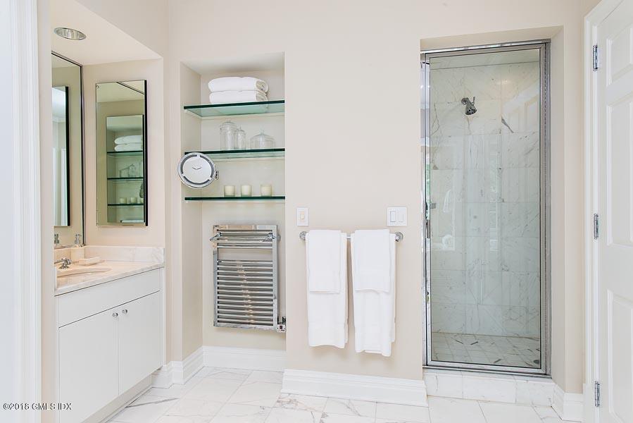 2 Round Hill Road Greenwich, CT 06831 - Photo 21 of 34 a bathroom with a shower and a sink