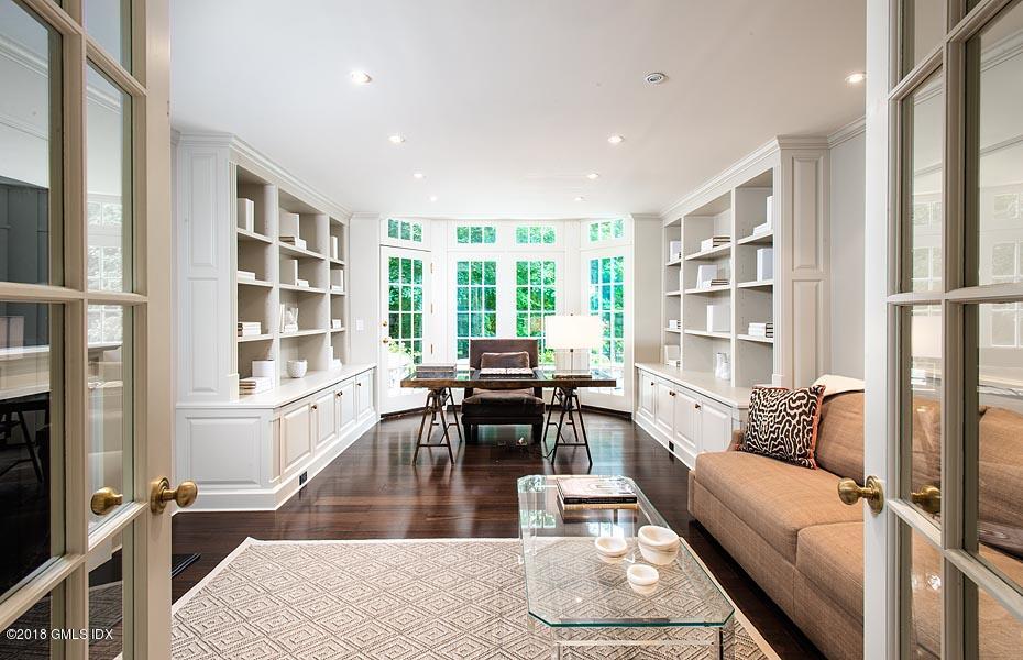 2 Round Hill Road Greenwich, CT 06831 - Photo 7 of 34 a living room with furniture a window and a table