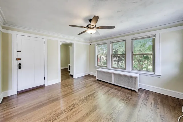 a kitchen with granite countertop a sink stove and cabinets