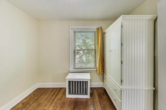 a bathroom with a shower and a sink