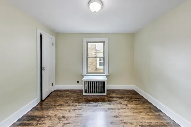 a view of entryway with window and ceiling fan