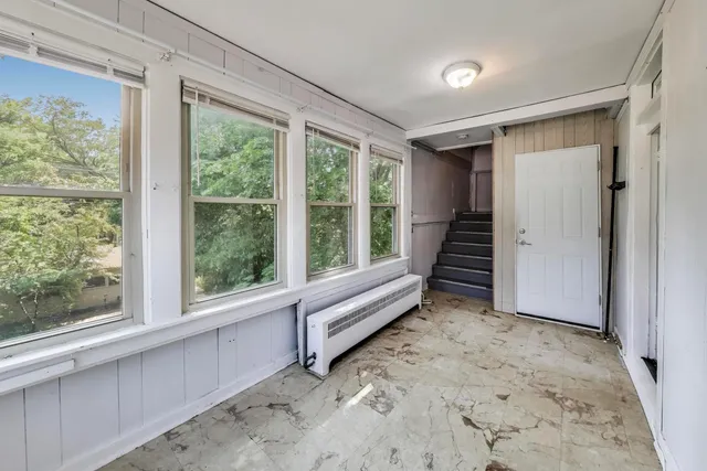 an empty room with windows